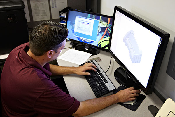 Elkhart Plastics' engineer